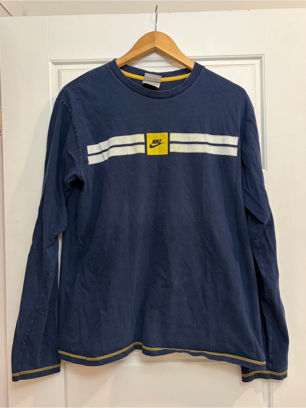 Nike Navy Long Sleeve Tee with White Stripes and Yellow Logo